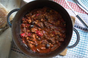 Spanish-inspired stew with lamb hearts, peppers, chickpeas and olives. Spanish-inspired stew with lamb hearts, peppers, chickpeas and olives.