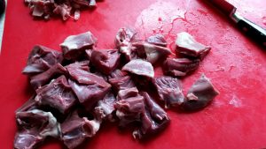 Lamb heart being prepared for cooking. Lamb heart being prepared for cooking.