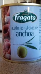 Can of anchovy-stuffed olives. Can of anchovy-stuffed olives.