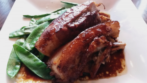 (Not so) cripsy pork belly, ginger glaze, spring greens, Henrick's Edinburgh.